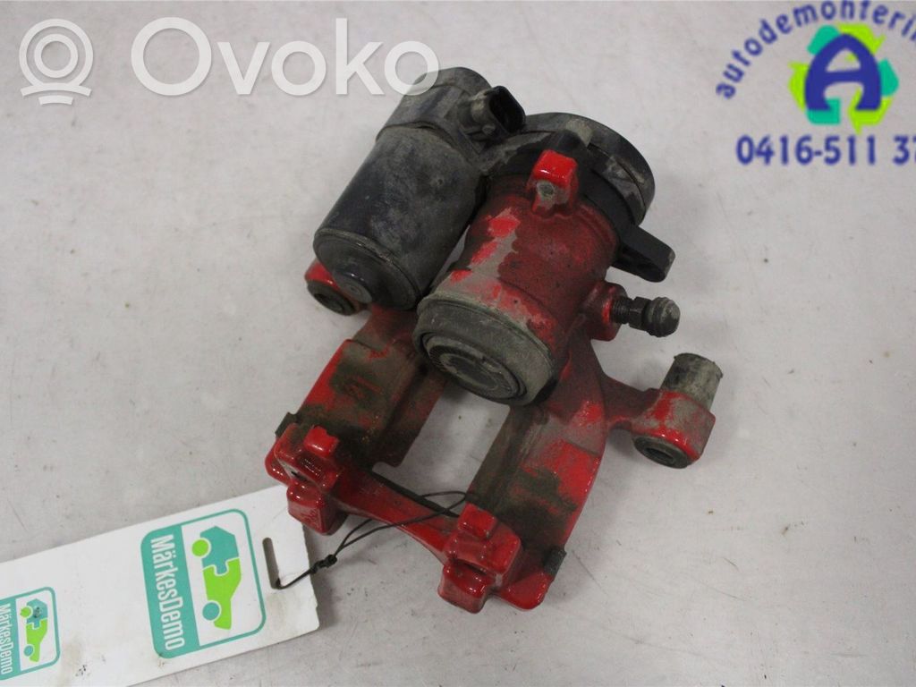 Ford Mondeo MK V Tylny zacisk hamulcowy 