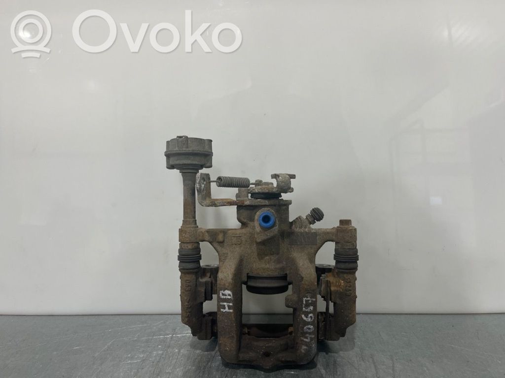 Opel Astra J Tylny zacisk hamulcowy 