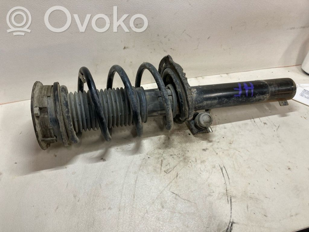 Volkswagen Caddy Amortyzator osi przedniej ze sprężyną 