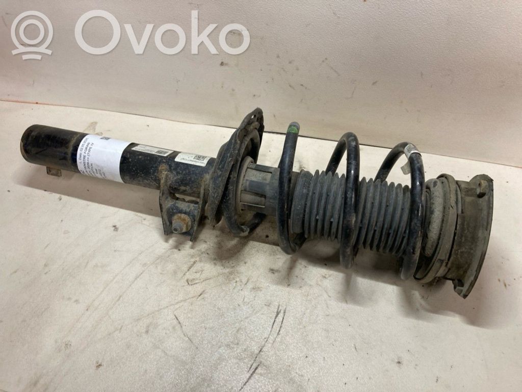 Volkswagen Caddy Amortyzator osi przedniej ze sprężyną 