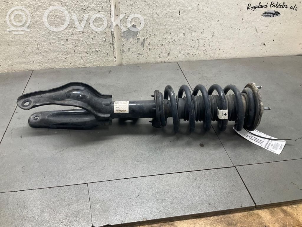 Tesla Model Y Etuiskunvaimennin kierrejousella 