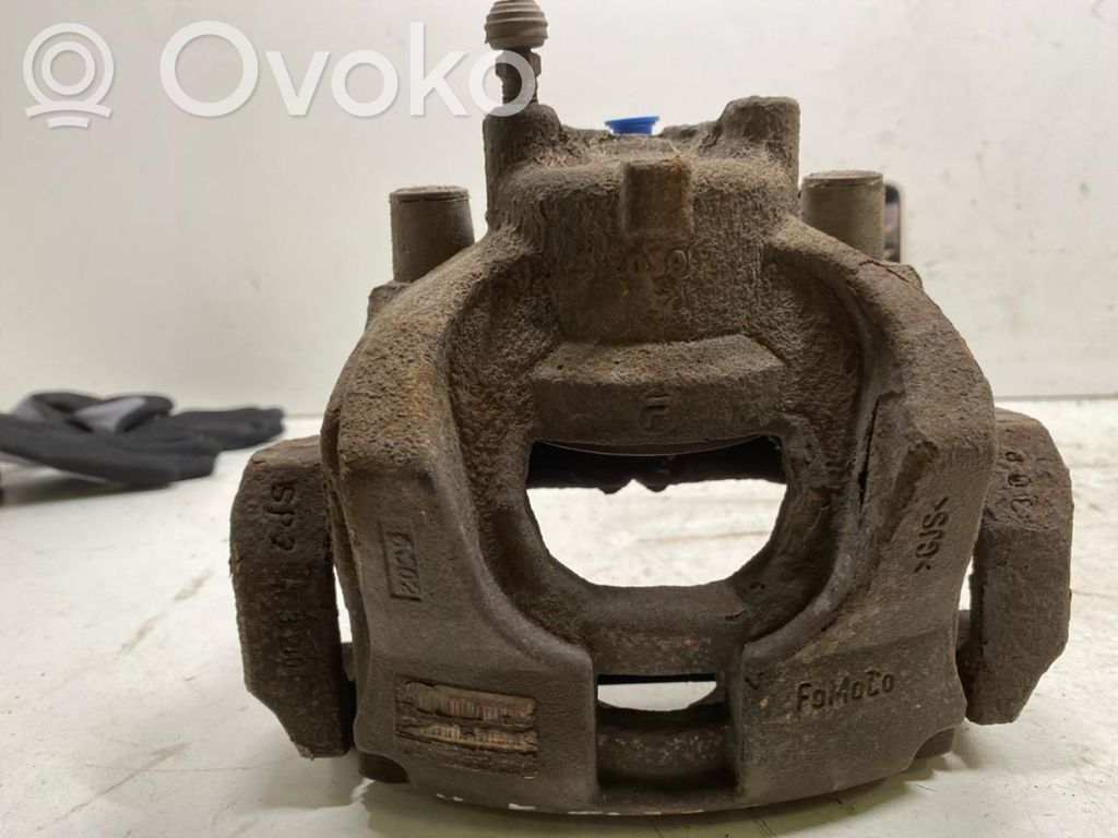 Ford Mondeo MK V Zacisk hamulcowy przedni 