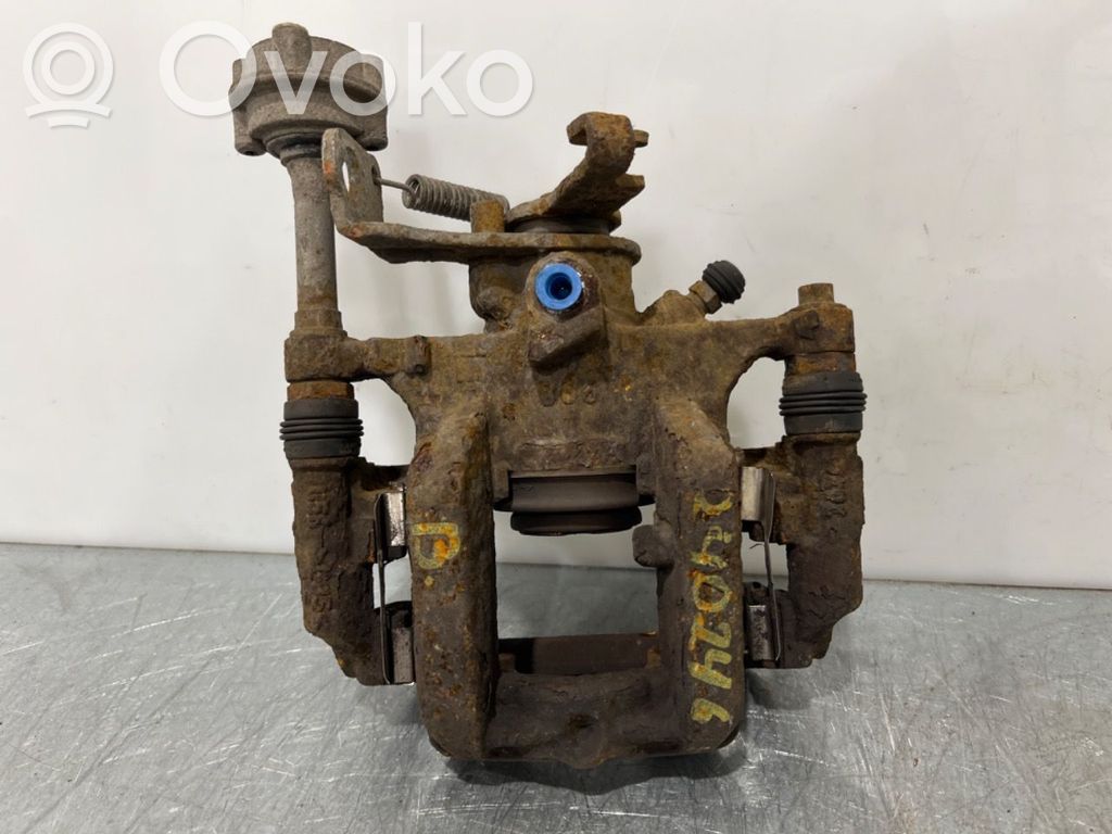 Opel Astra J Tylny zacisk hamulcowy 