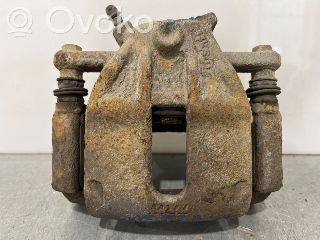 Nissan Note (E11) Pinza del freno anteriore 