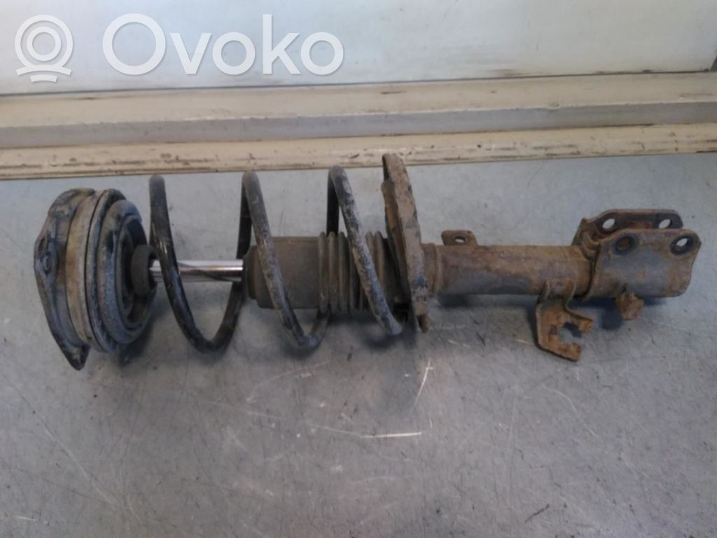 Nissan Note (E11) Amortiguador delantero con muelle espiral 