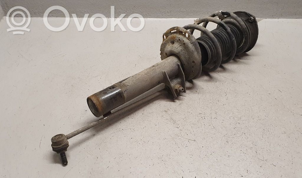 Volkswagen Caddy Amortyzator osi przedniej ze sprężyną 