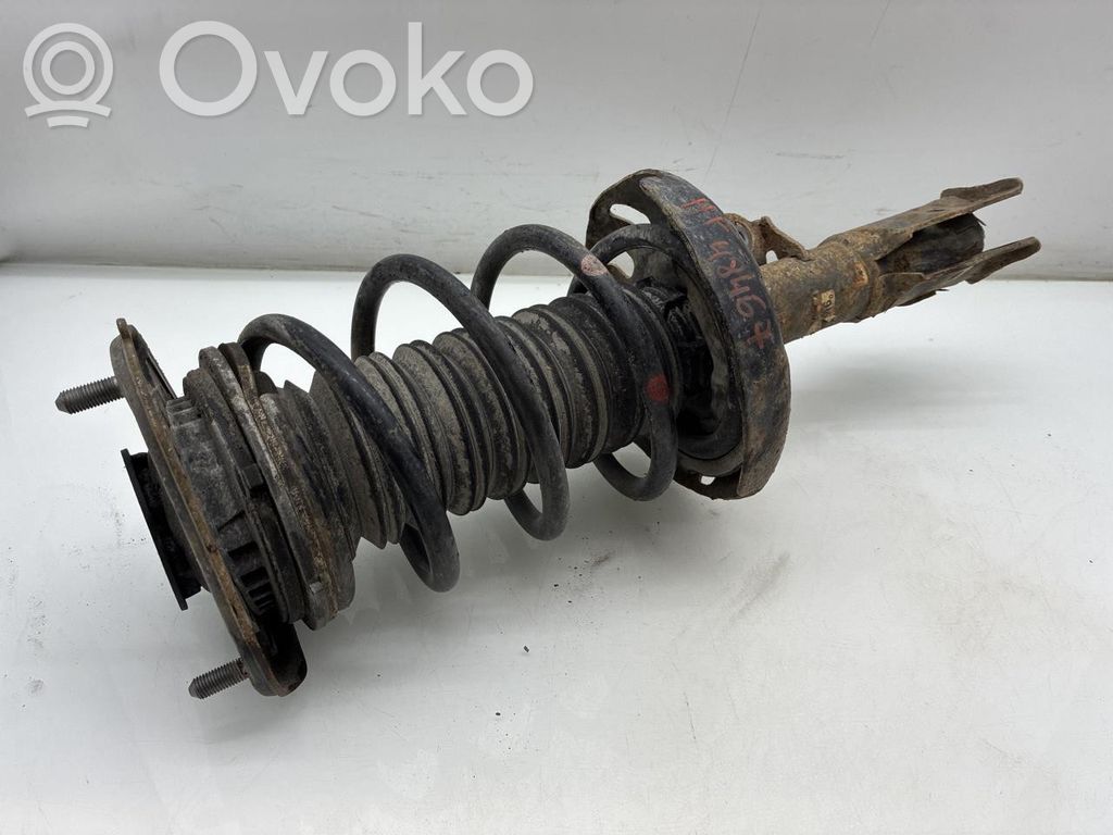Toyota Corolla E210 E21 Передний амортизатор с пружиной