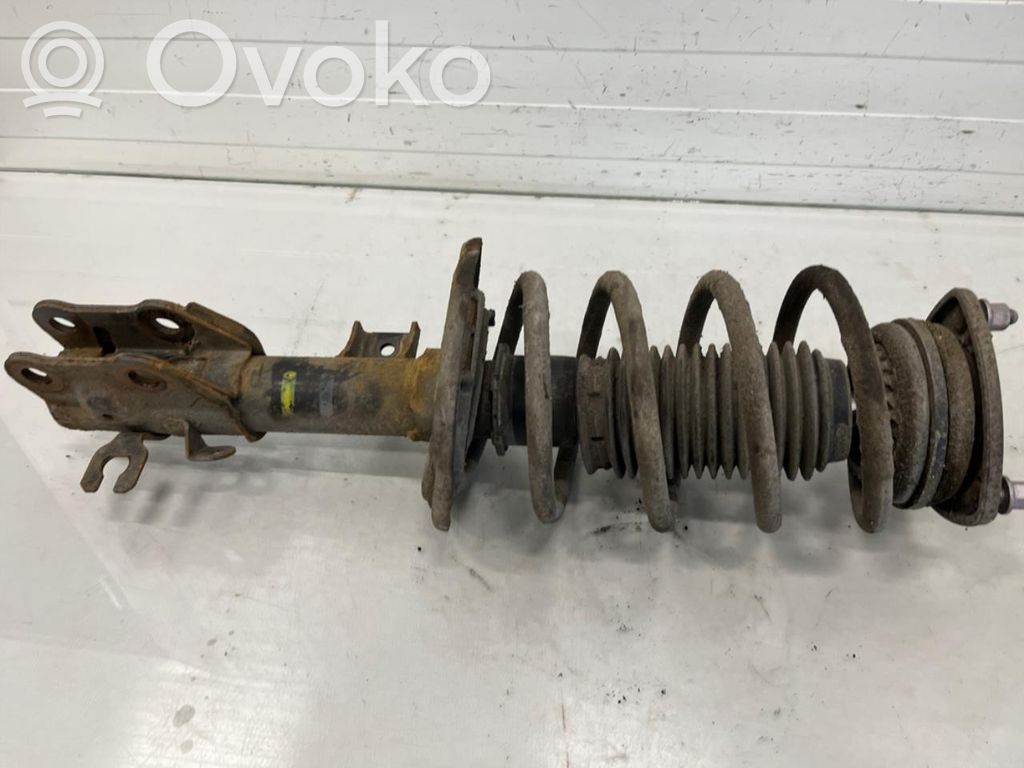 Front shock absorber with coil spring
