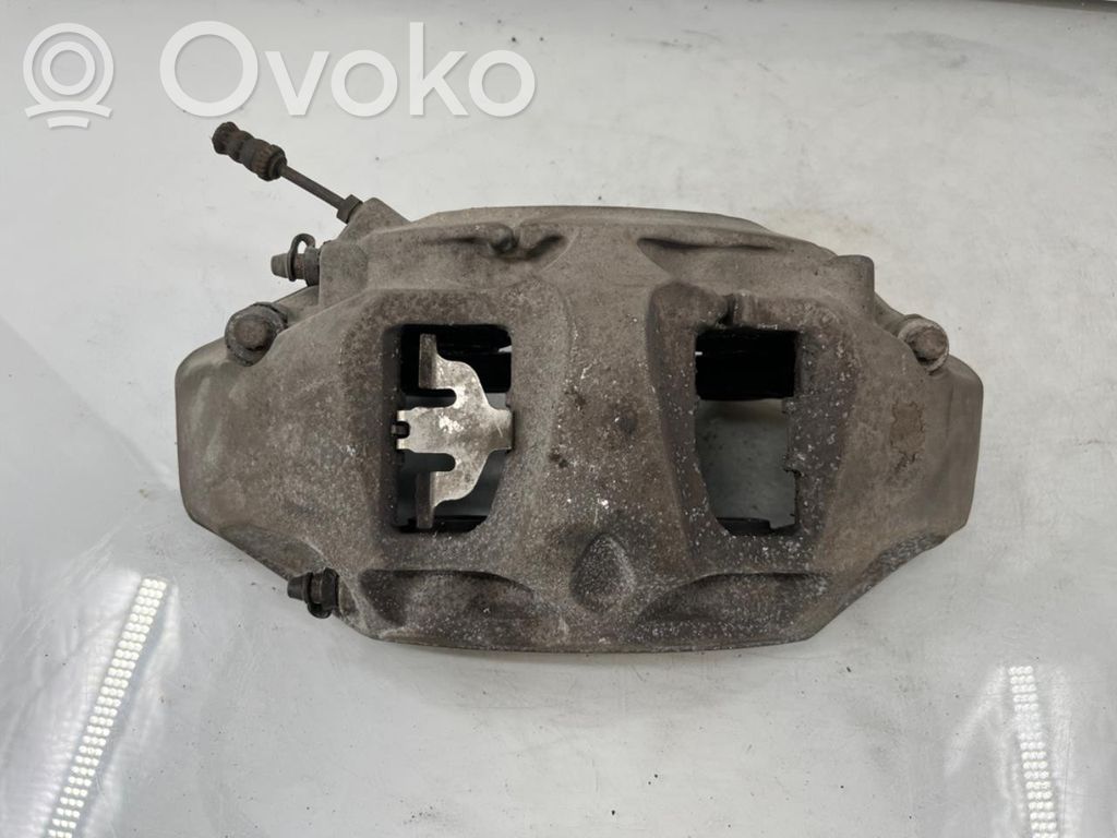 Audi Q7 4M Zacisk hamulcowy przedni