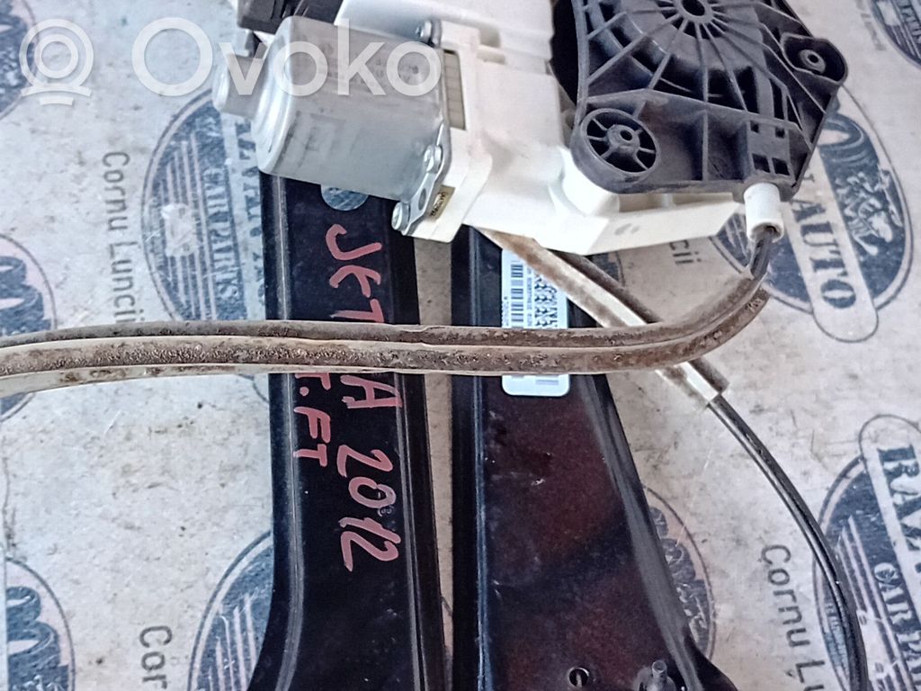 Volkswagen Jetta I Front door window regulator with motor 