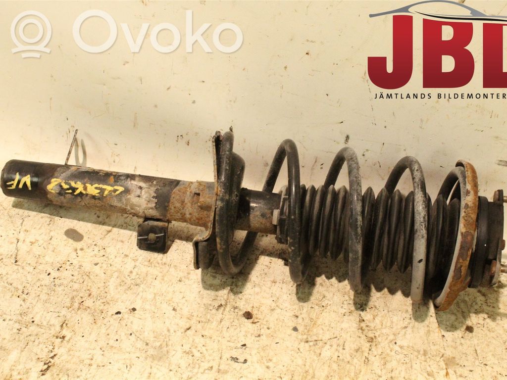 Front shock absorber with coil spring   1202275