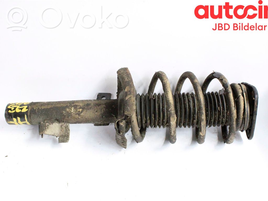 Front shock absorber with coil spring