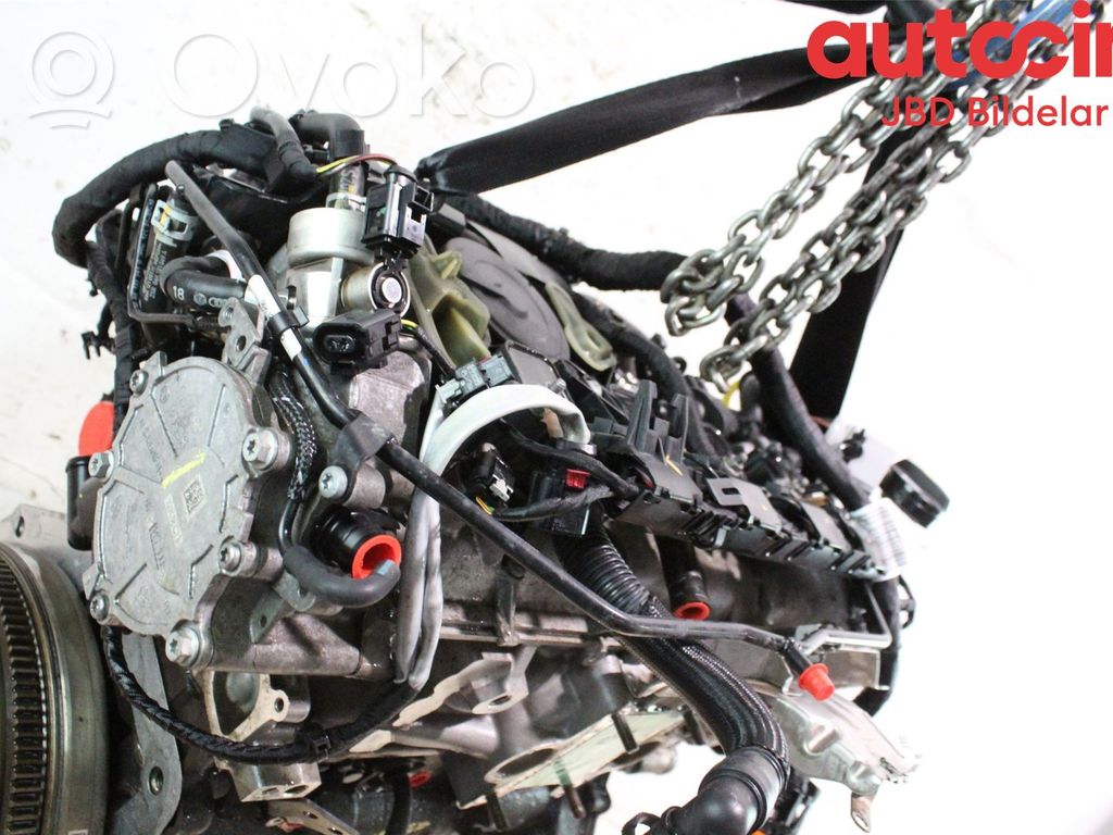 Motor   06K100040B