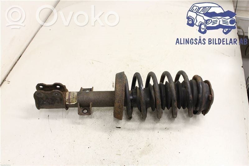 Front shock absorber with coil spring