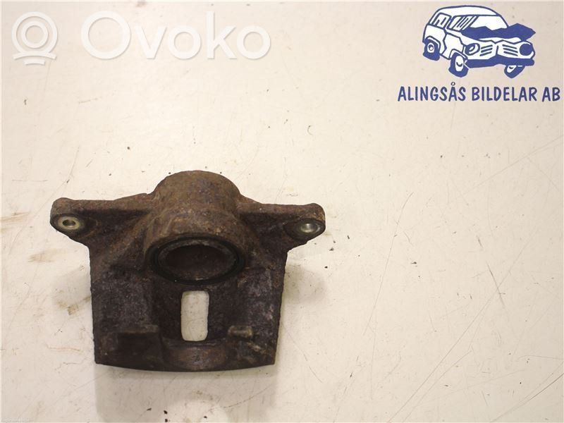 Toyota Yaris Zacisk hamulcowy przedni 