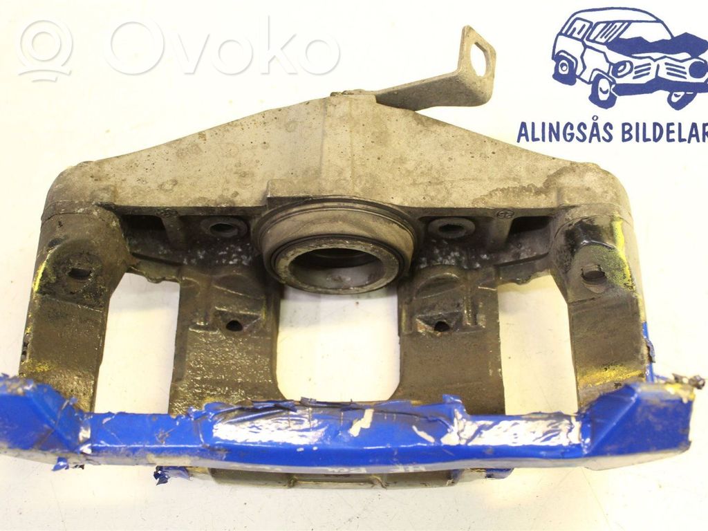 Volkswagen Golf VI Zacisk hamulcowy przedni 