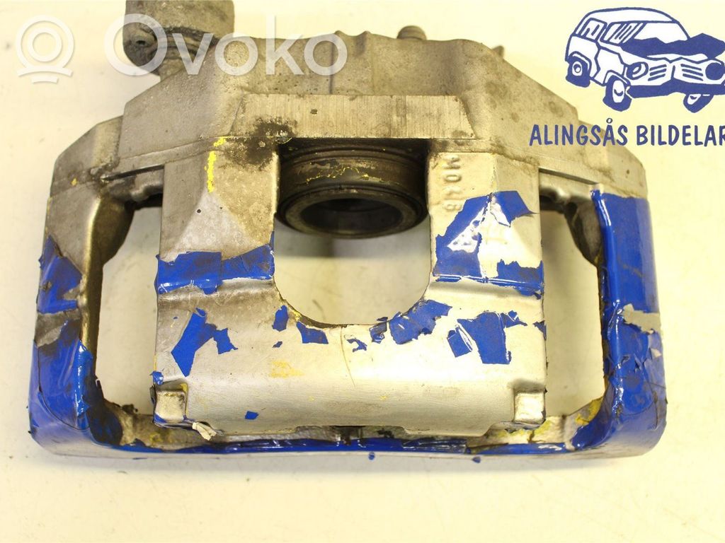Volkswagen Golf VI Zacisk hamulcowy przedni 