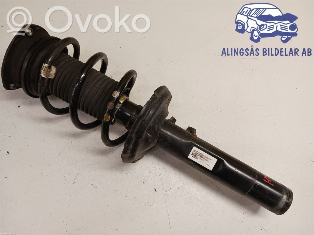 Volkswagen Golf VII Amortyzator osi przedniej ze sprężyną 