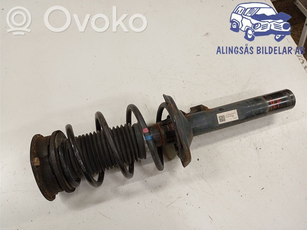 Volkswagen Golf VII Amortyzator osi przedniej ze sprężyną 