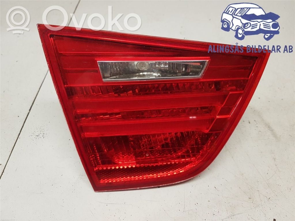 BMW 3 E90 E91 Aizmugurējais lukturis pārsegā 