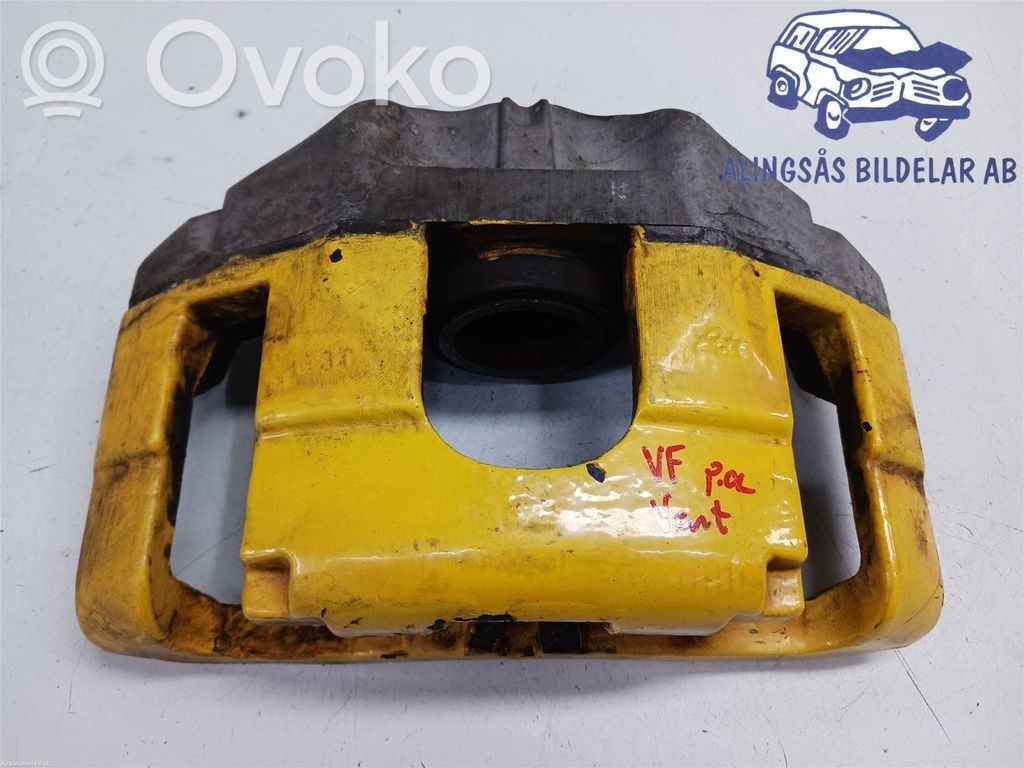 Volkswagen Golf V Zacisk hamulcowy przedni 