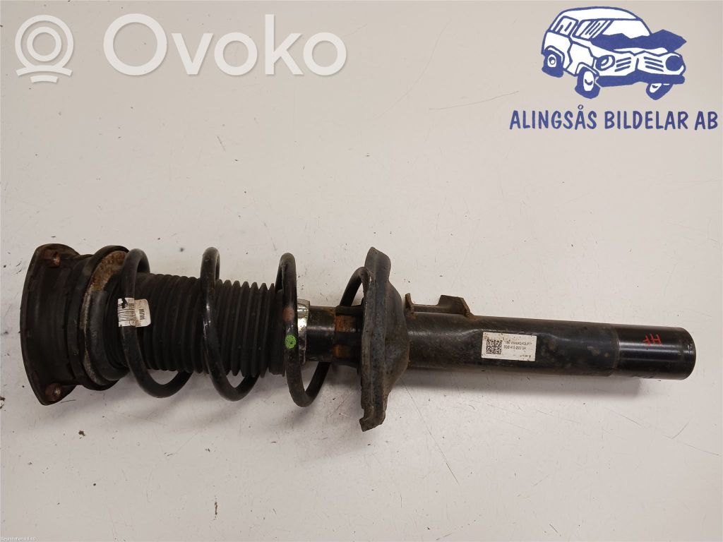 Volkswagen Golf VII Amortyzator osi przedniej ze sprężyną 