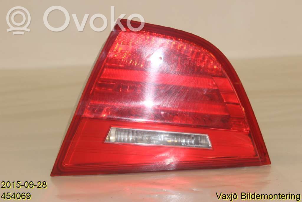 BMW 3 E90 E91 Aizmugurējais lukturis pārsegā 