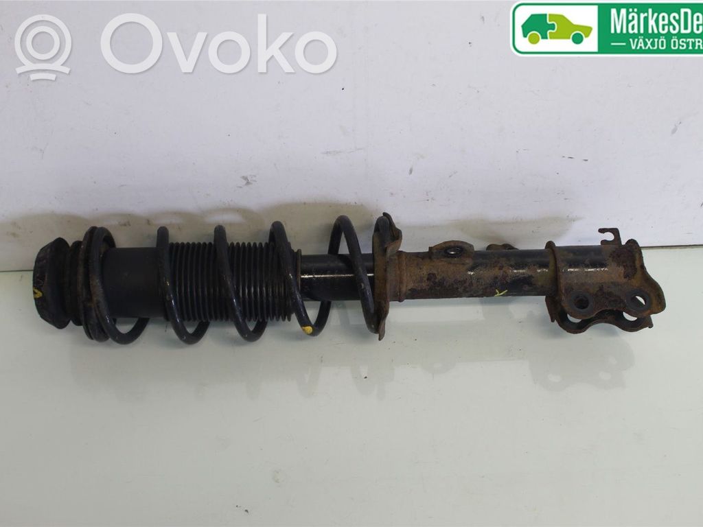Nissan Note (E12) Front shock absorber with coil spring 