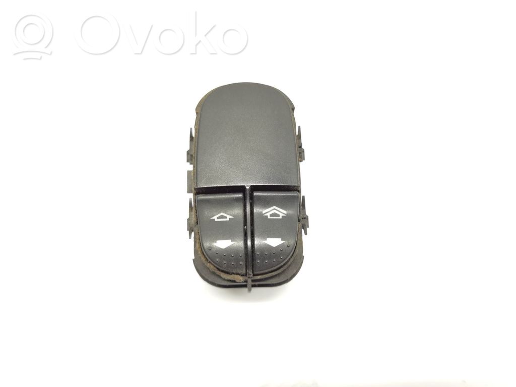 Electric window control switch   98AG14529AC
