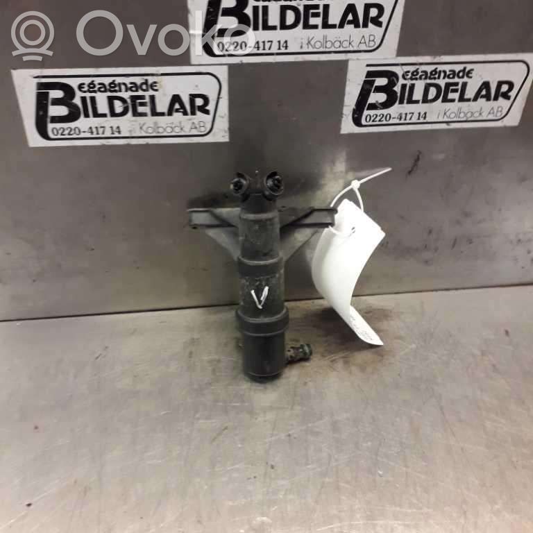 Headlight washer spray nozzle