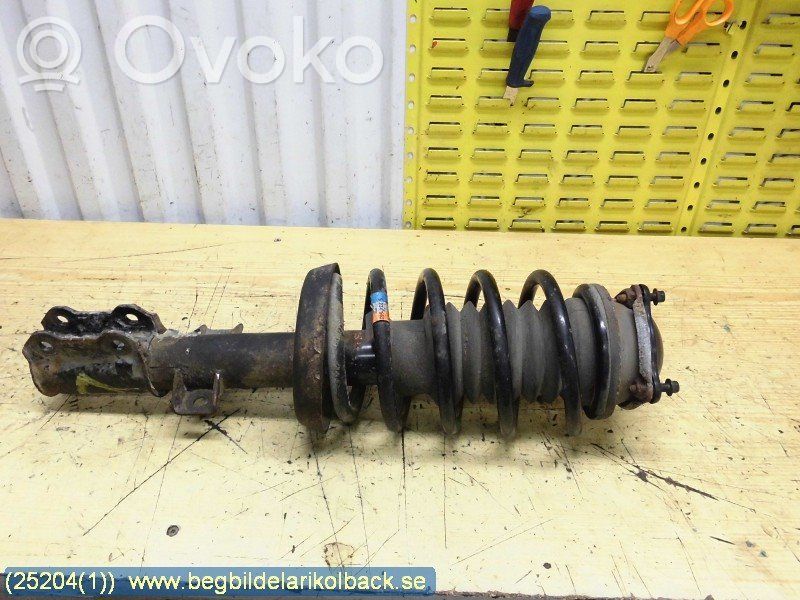 Front shock absorber with coil spring
