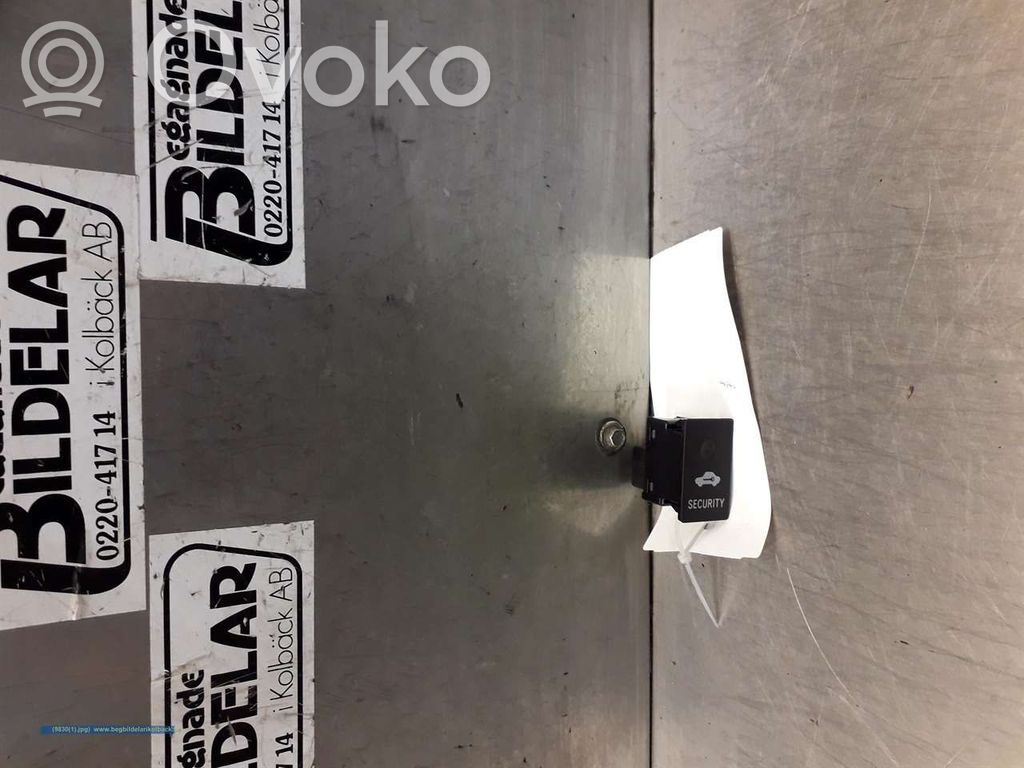 Botón interruptor de bloqueo de puertas