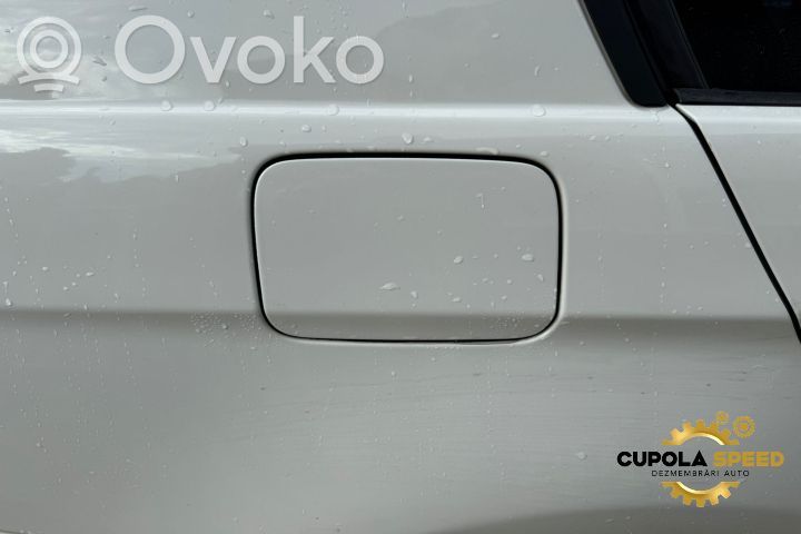Fuel tank cap trim