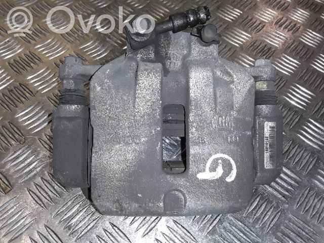 Opel Insignia A Zacisk hamulcowy przedni 