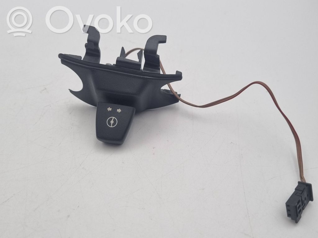 Steering wheel adjustment switch   6966710,61316966710