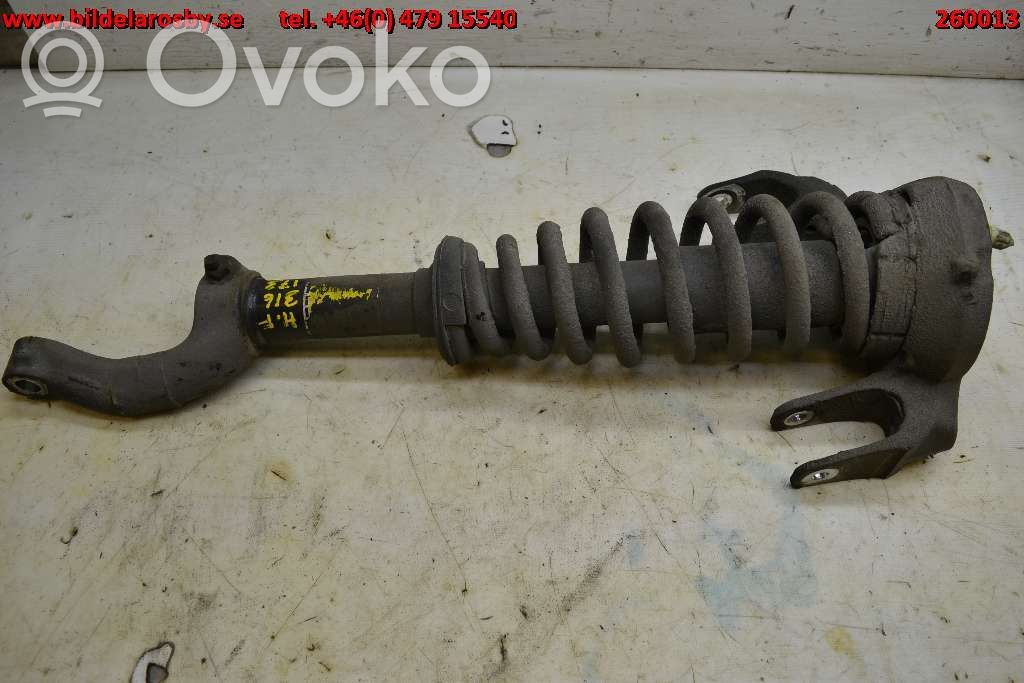 Cadillac SRX Front shock absorber with coil spring 