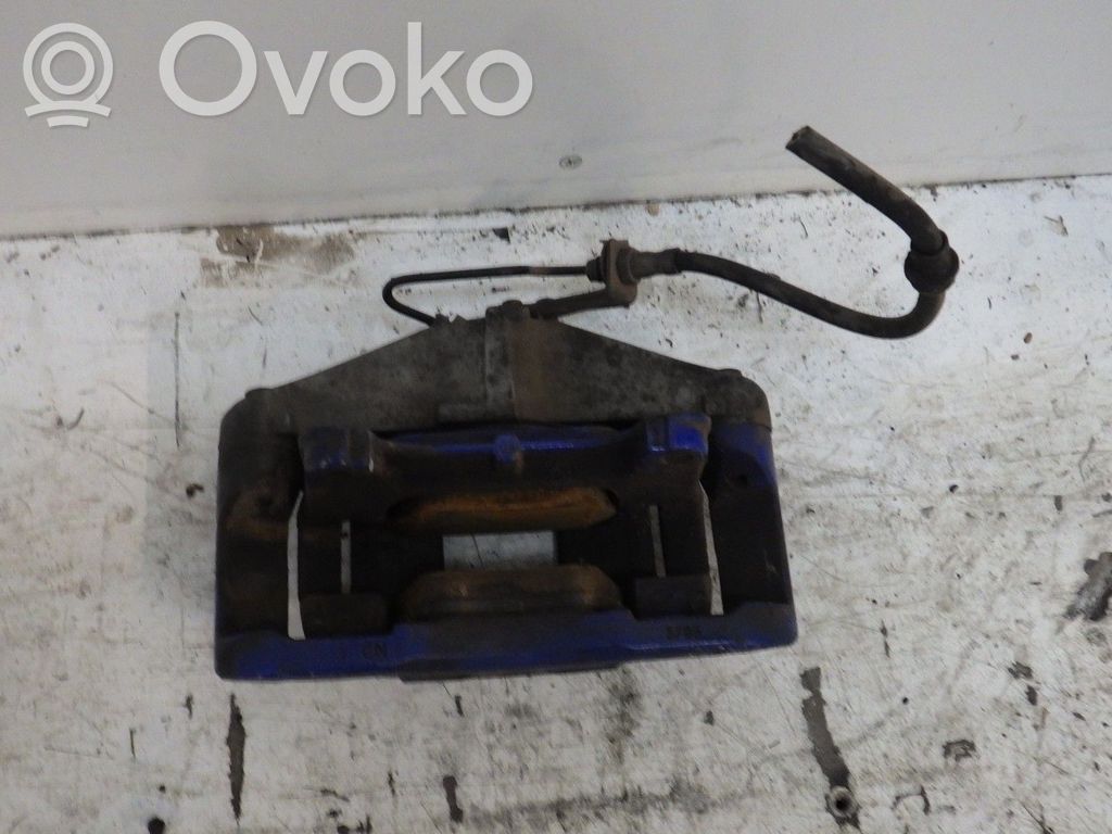 Volkswagen Golf V Zacisk hamulcowy przedni 