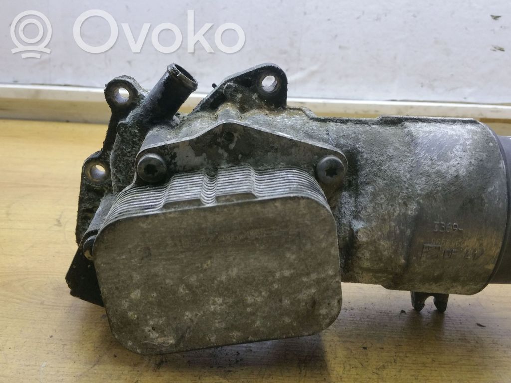 Suzuki SX4 Oil filter mounting bracket 
