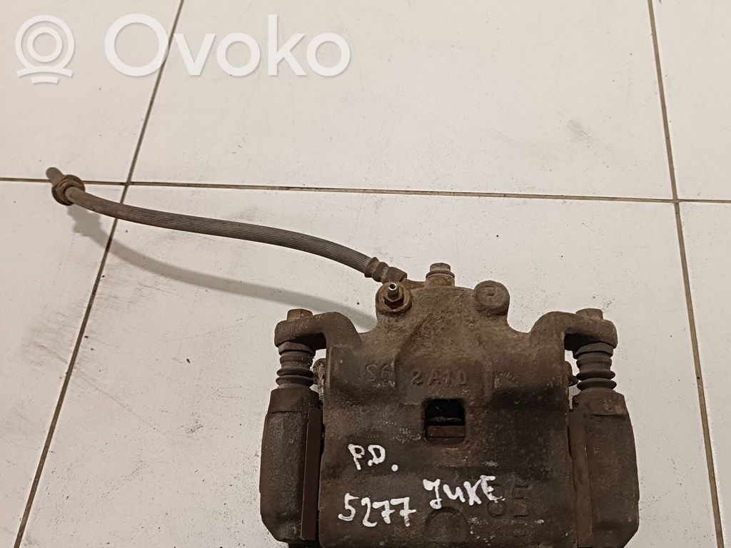 Nissan Juke I F15 Caliper de freno delantero 