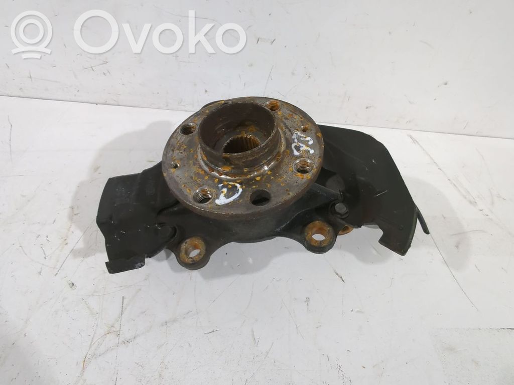 Opel Corsa D Zwrotnica koła przedniego 