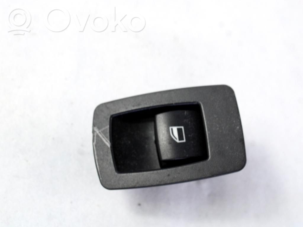 Electric window control switch   6935534