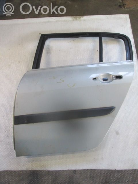 Puerta trasera   7751473732