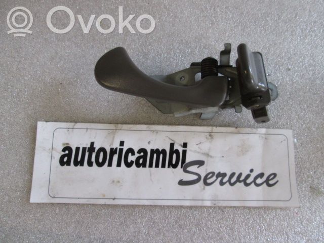 Mitsubishi Pajero Sport I Manecilla interna puerta delantera 