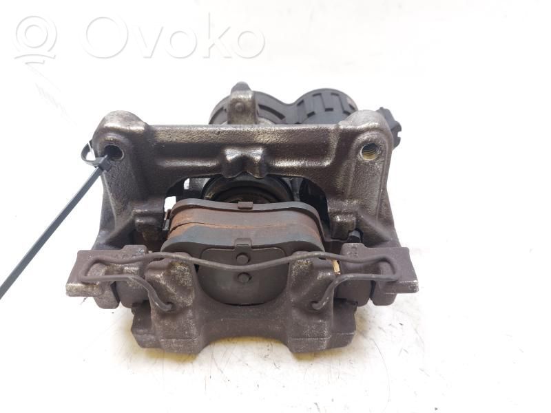 Ford Focus Zacisk hamulcowy przedni 