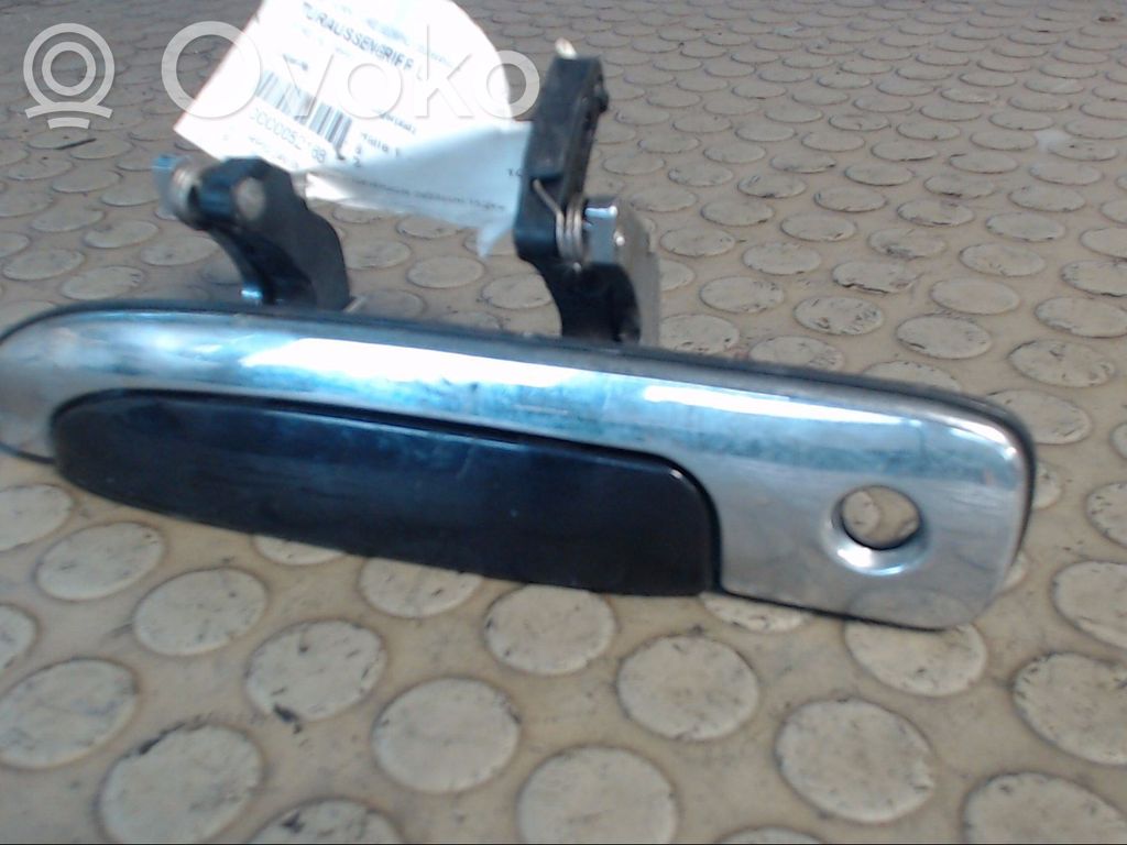 Manecilla externa puerta delantera