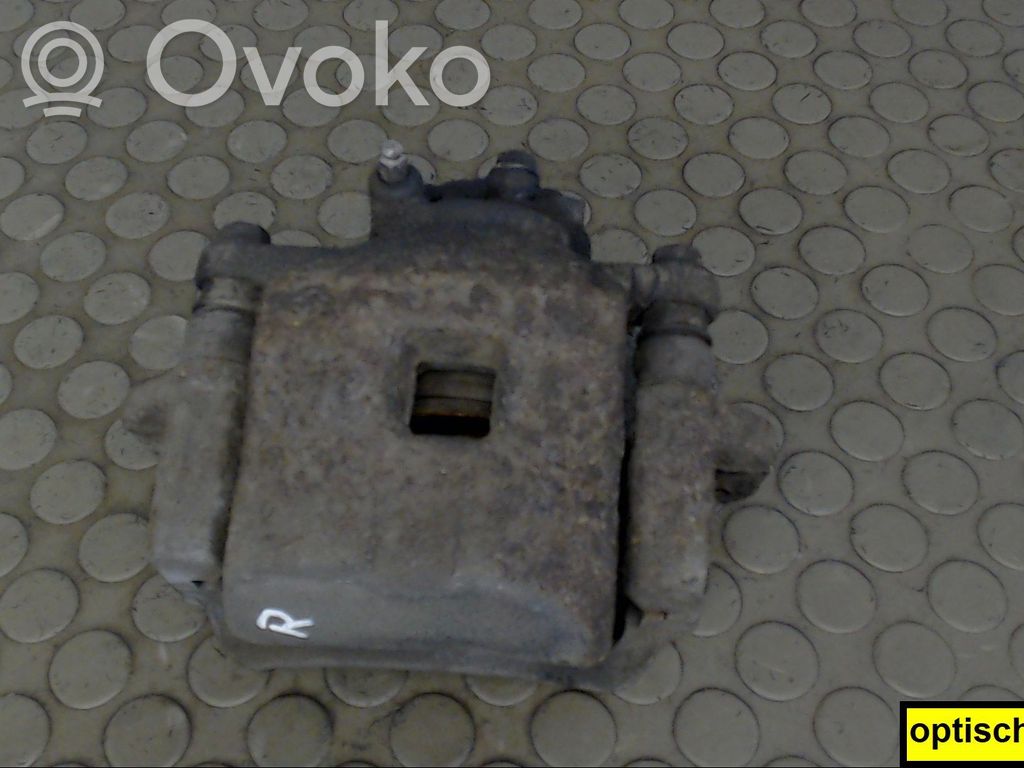 Mazda 323 Front brake caliper 