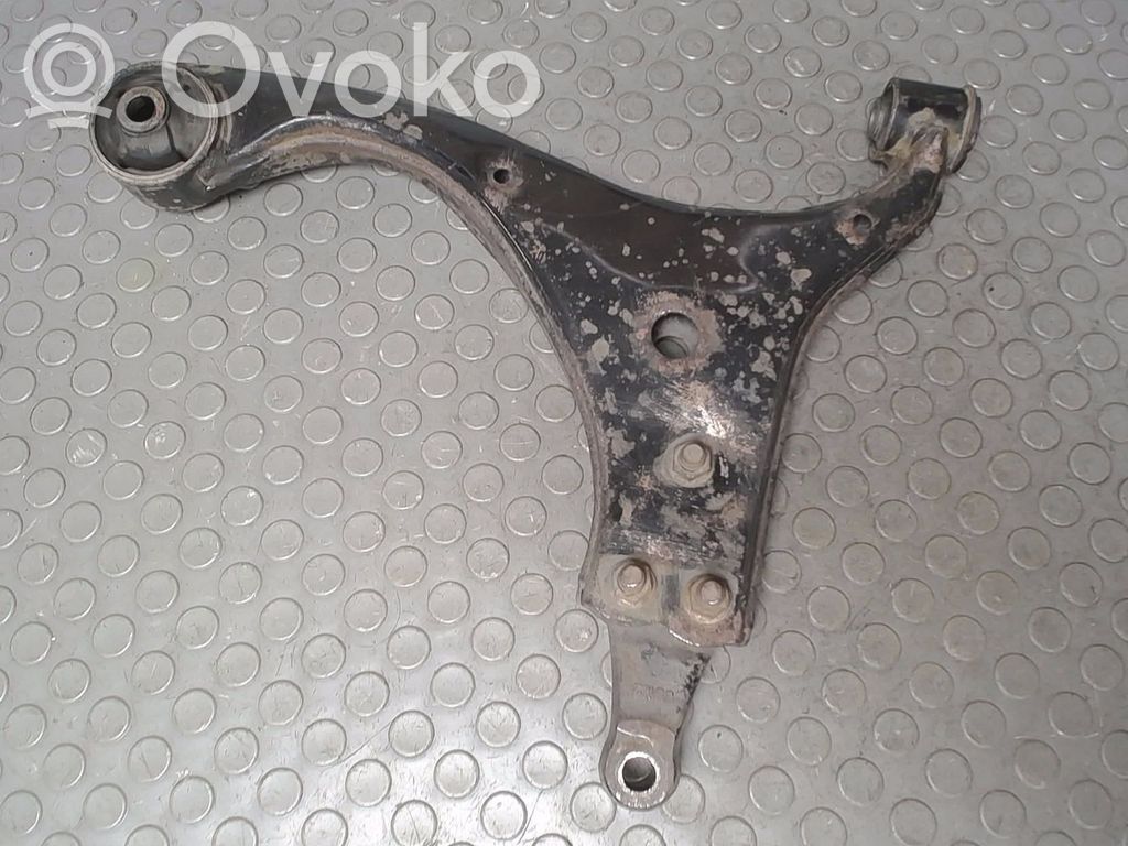 KIA Carens II Dolny wahacz przedni 