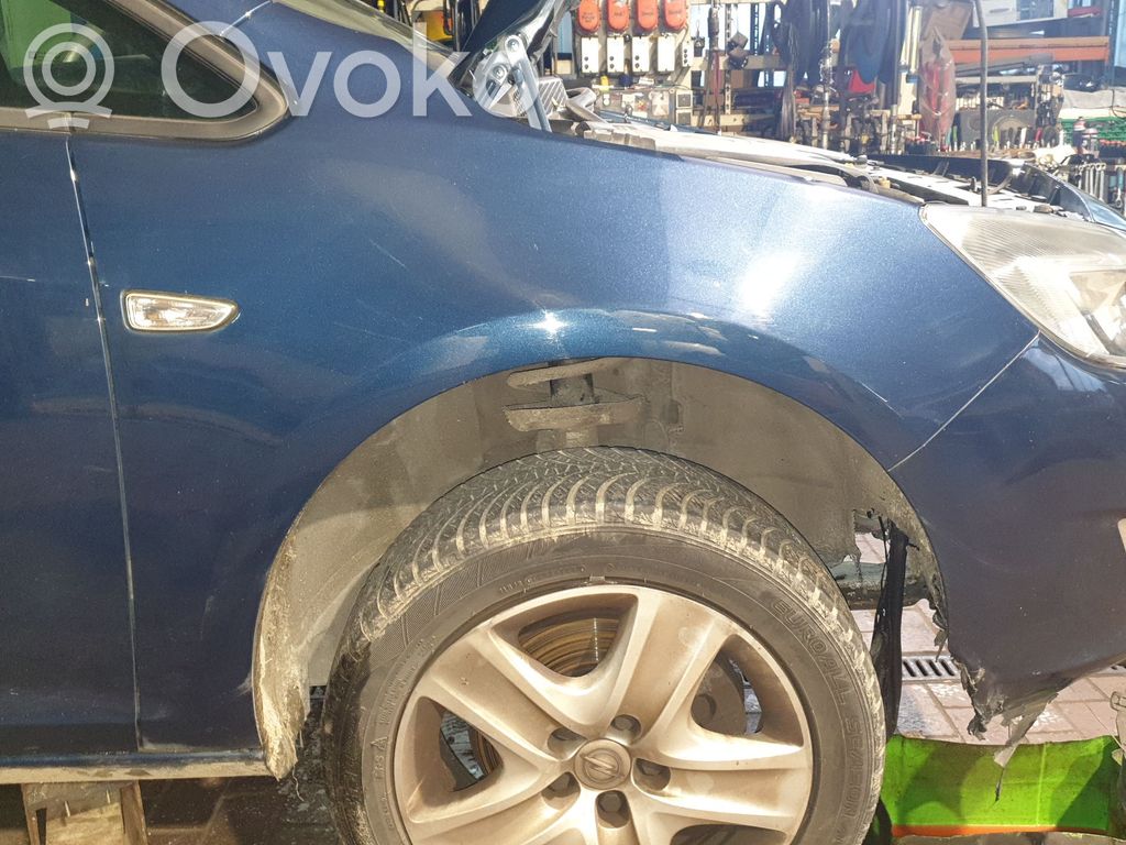 Opel Astra J Błotnik przedni