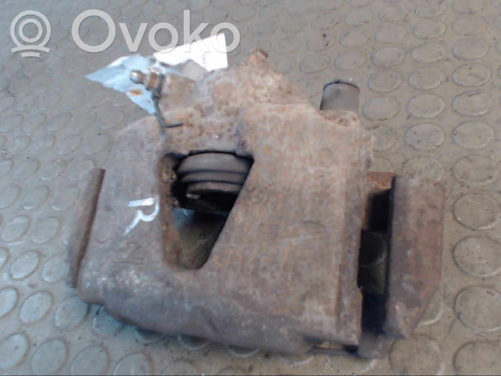 Opel Astra F Zacisk hamulcowy przedni 