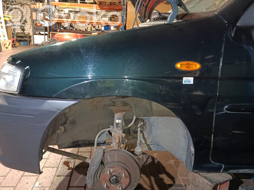 Mazda Demio Spārns 